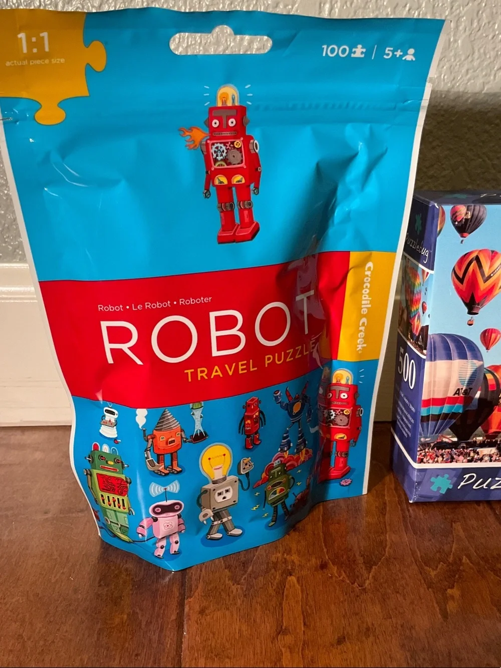2 puzzles: Robot travel puzzle, hot air balloon NWT